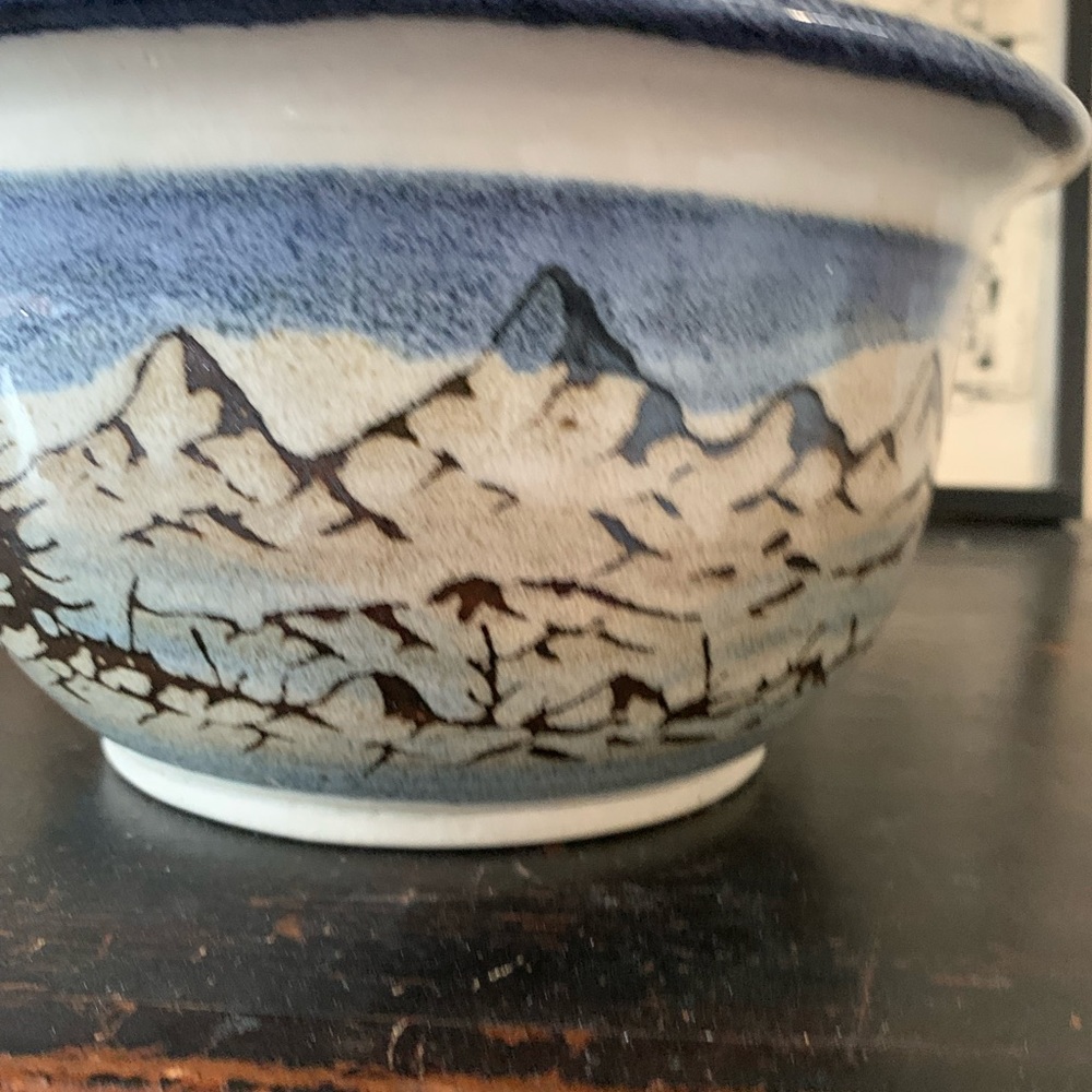 Hand thrown ceramic bowl with hand-painted mountain seen